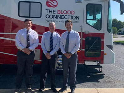 Attorneys Kyle M Blodgett Charles R Hardee and M Brack Massey at Blood Connection Blood Drive 2022